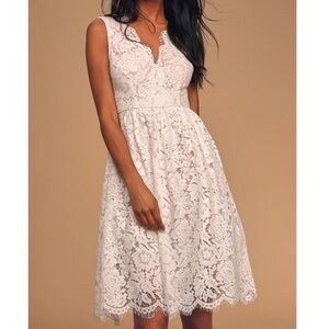 Lulu’s white lace skater dress in size large. Never worn.